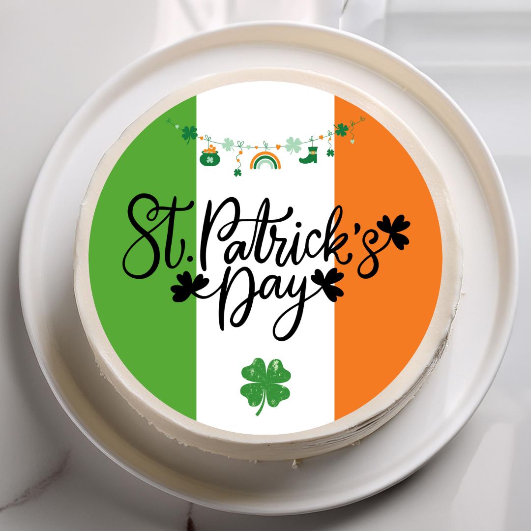 St. Patrick's Day cake with green, white, and orange colors on a white plate.