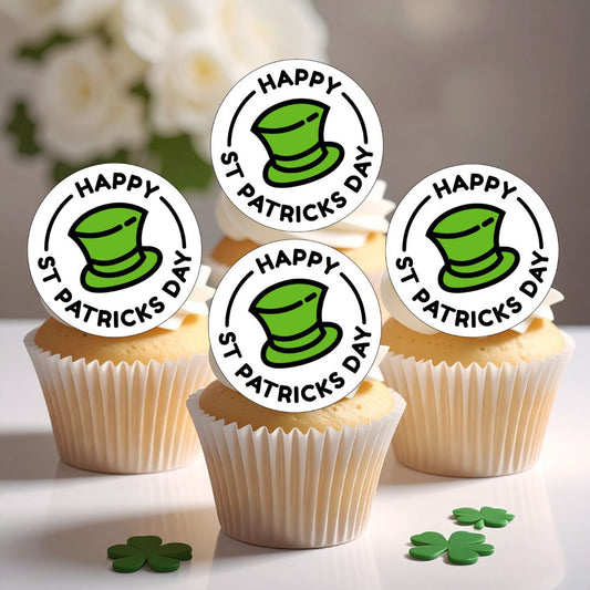 Cupcakes with St. Patrick's Day-themed toppers on a white surface.