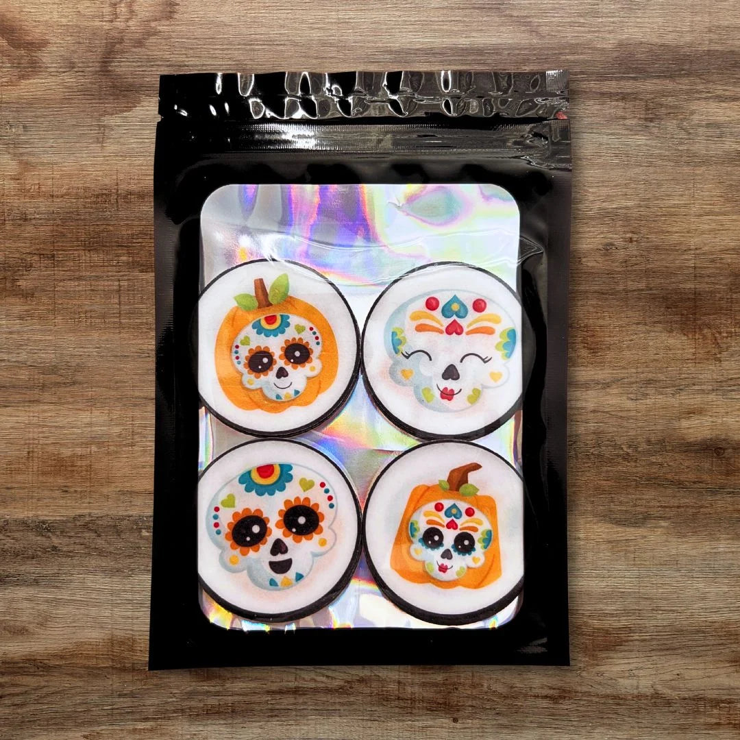 Halloween Sugar Skulls Theme Edible Cupcake Toppers in packaging 