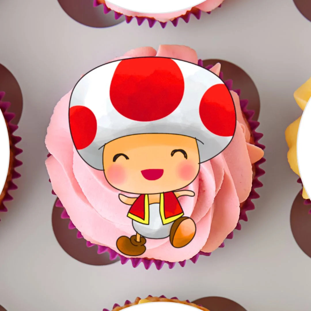 close up of Super Mario Themed Edible Cupcake Toppers on a pink frosted cupcake 