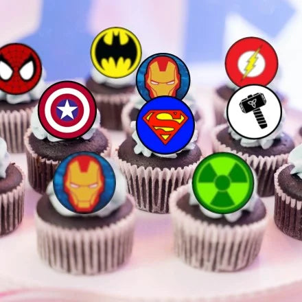 Superhero Theme Edible Cupcake Toppers on chocolate cupcakes with white frosting