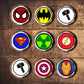 Superhero Theme Edible Cupcake Toppers on chocolate cupcakes with white frosting