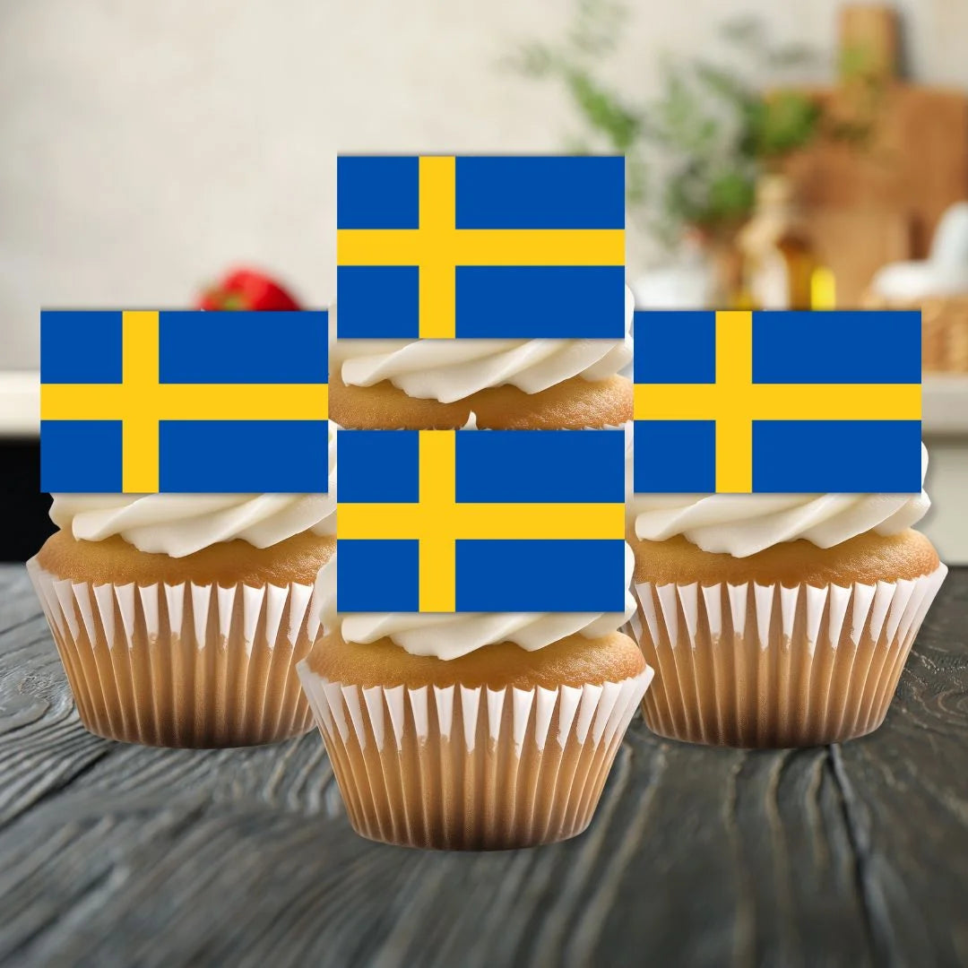 Sweden Flag Edible Cupcake Toppers on white frosted cupcakes