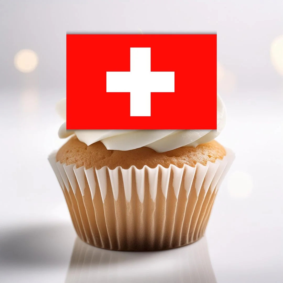 frosted cupcake with a switzerland flag cake topper