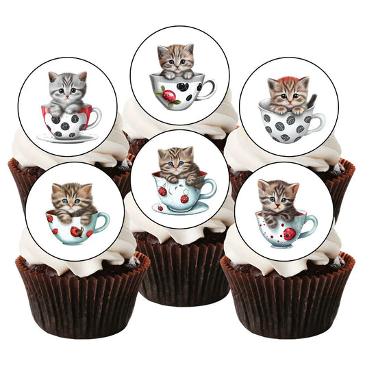  cupcakes with white frosting and illustrated cupcake toppers featuring cute cats in tea cups. 