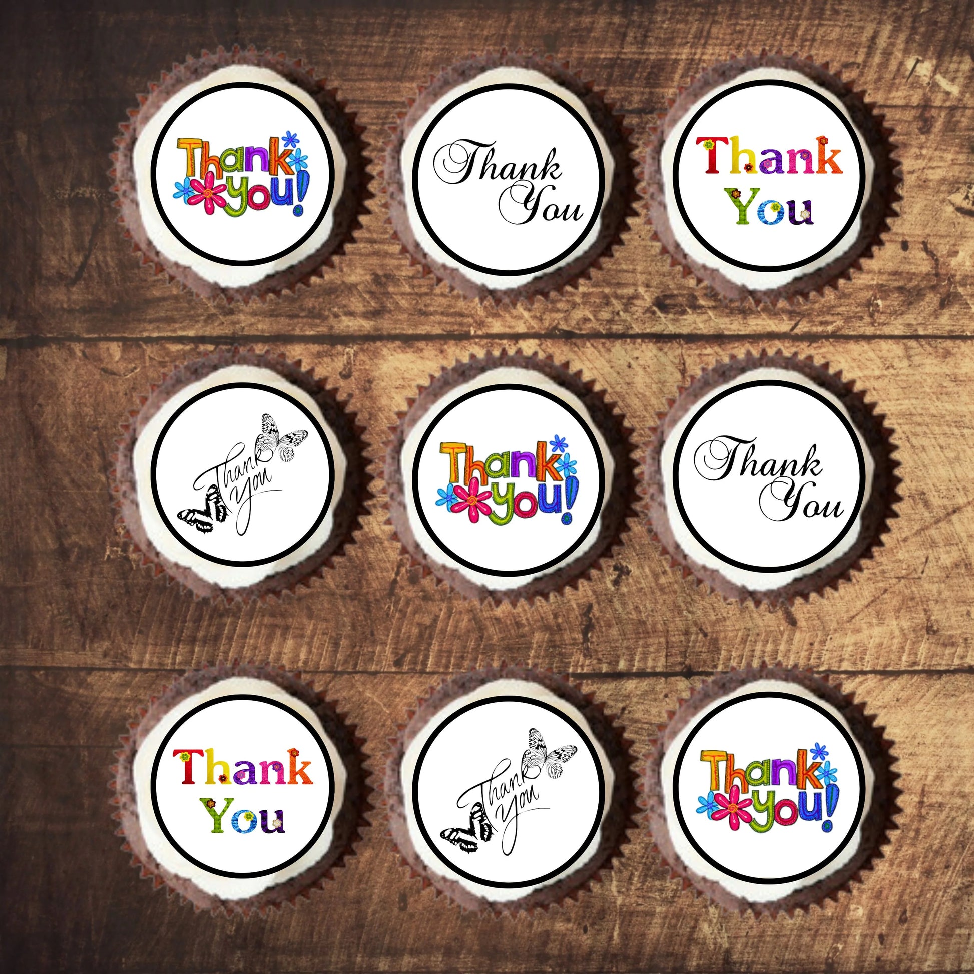 Thank You Mix Edible Cupcake Toppers on white frosted cupcakes 