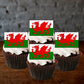 Welsh Flag Edible Cupcake Toppers on white frosted cupcakes